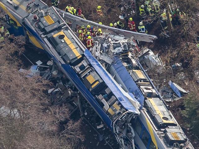 Aerial view of rescue forces working at the site of a train accident near Bad Aibling, Germany, Tuesday, Feb. 9, 2016.(AP Photo)