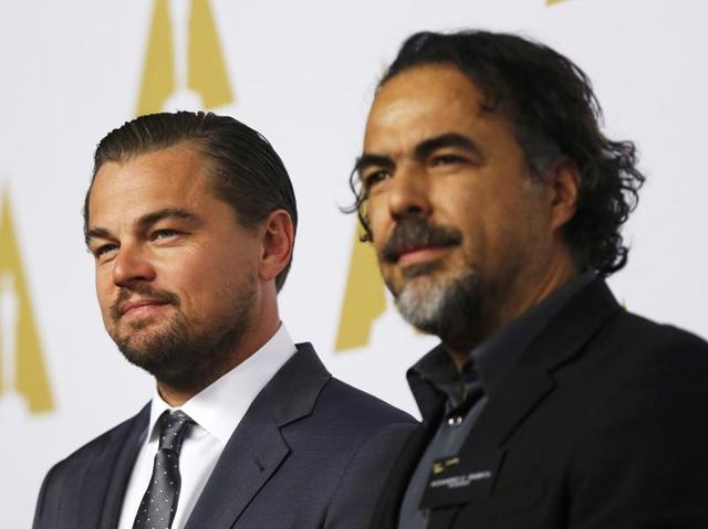 Leonardo DiCaprio and director Alejandro Gonzalez Inarritu pose for the cameras. Leo has been nominated in the Best Actor category and Innaritu in Best Director for The Revenant. (REUTERS)