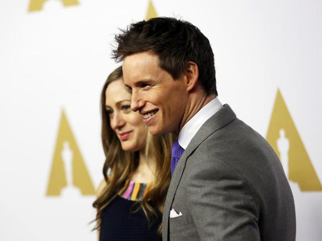 Eddie Redmayne and his wife, Hannah Bagshawe, arrive at the luncheon. Eddie is nominated in the Best Actor category for The Danish Girl. (REUTERS)