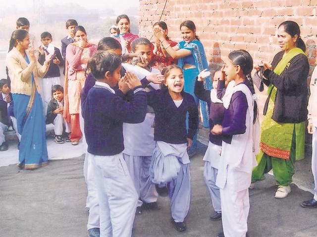 Students singing the National Anthem during Republic Day celebrations at the Gobindpura madrasa in Chandigarh. (HT Photo) Students singing the National Anthem during Republic Day celebrations at the Gobindpura madrasa in Chandigarh. (HT Photo)