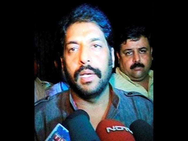 Haryana's home minister Gopal Kanda talks to newsmen outside his residence in Gurgaon on Sunday. (PTI Photo) Haryana's home minister Gopal Kanda talks to newsmen outside his residence in Gurgaon on Sunday. (PTI Photo)