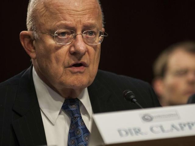 Director of National Intelligence James Clapper waits for the Senate (Select) Intelligence Committee hearing to begin in Washington. (AFP Photo)