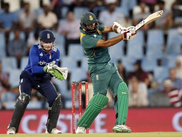 South African batsman Hashim Amla celebrates after scoring his century. (AFP Photo)