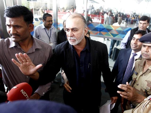 Tarun Tejpal, founder and editor-in-chief of Tehelka, speaks with the media at the airport on his way to Goa. (REUTERS) Tarun Tejpal, founder and editor-in-chief of Tehelka, speaks with the media at the airport on his way to Goa. (REUTERS)
