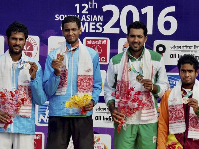 Gold medal winners Prarthana Thombare and Sharrmadaa Baluu during the South Asian Games .(PTI Photo) Gold medal winners Prarthana Thombare and Sharrmadaa Baluu during the South Asian Games .(PTI Photo)