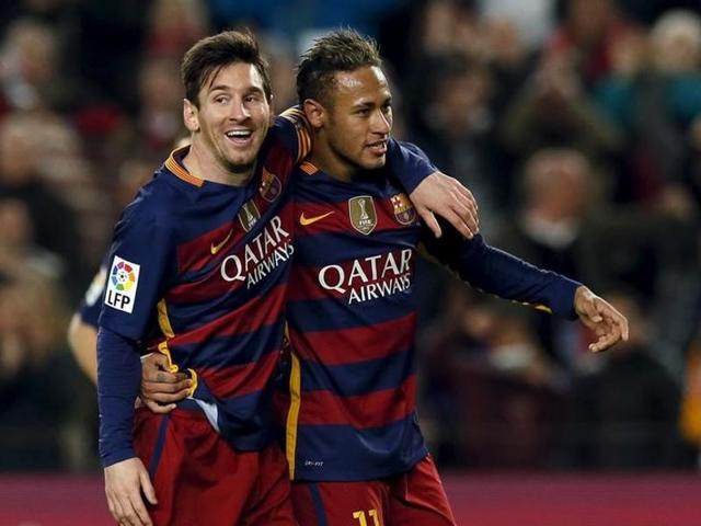 Barcelona's Neymar and Lionel Messi (L) celebrate a goal against Valencia. (Reuters) Barcelona's Neymar and Lionel Messi (L) celebrate a goal against Valencia. (Reuters)
