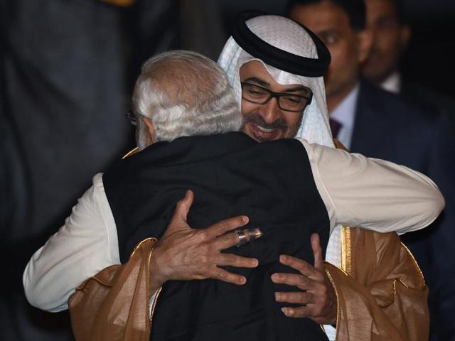 PM Narendra Modi (L) with Abu Dhabi’s crown prince Sheikh Mohamed Bin Zayed Al Nahyan at New Delhi airport on Wednesday. (AFP Photo) PM Narendra Modi (L) with Abu Dhabi’s crown prince Sheikh Mohamed Bin Zayed Al Nahyan at New Delhi airport on Wednesday. (AFP Photo)