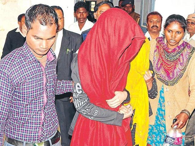 Police officials escort Sapphire International School teacher Nazia Hussain (left) and her husband Arif Ansari and their son. The three were produced in a Ranchi court on Thursday after being accused of killing Vinay Kumar Mahto, a student at the school. (HT photo) Police officials escort Sapphire International School teacher Nazia Hussain (left) and her husband Arif Ansari and their son. The three were produced in a Ranchi court on Thursday after being accused of killing Vinay Kumar Mahto, a student at the school. (HT photo)