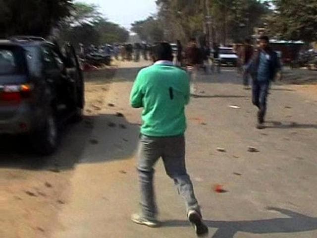 Devendra Singh clutches his heart after being shot at in Allahabad’s Bahadurpur district. (TV grab) Devendra Singh clutches his heart after being shot at in Allahabad’s Bahadurpur district. (TV grab)