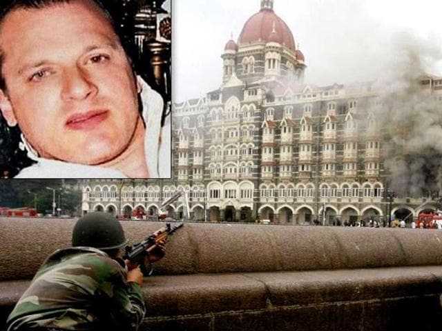 Smoke is seen billowing out of the ground and first floor of the Taj Hotel in South Mumbai during "Operation Cyclone" following the 26/11 terror attacks in 2008.(PTI File Photo)