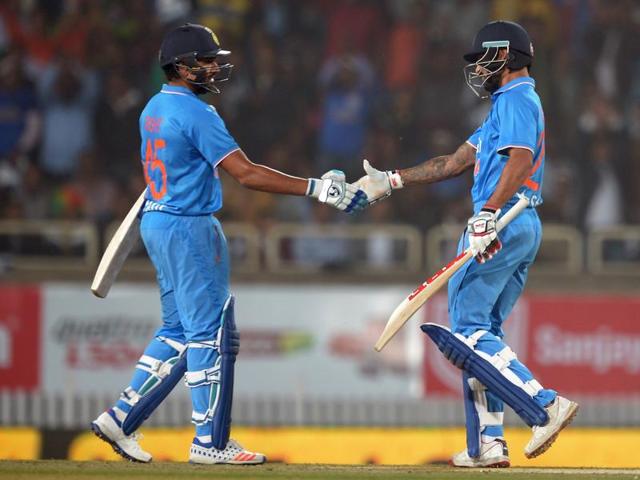 India's Shikhar Dhawan celebrates with teammate Rohit Sharma celebrate after scoring a half-century. (AFP Photo) India's Shikhar Dhawan celebrates with teammate Rohit Sharma celebrate after scoring a half-century. (AFP Photo)