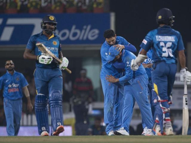 Indian bowler Yuvraj Singh congratulates teammate Rohit Sharma. (AP Photo) Indian bowler Yuvraj Singh congratulates teammate Rohit Sharma. (AP Photo)