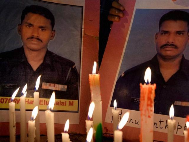 NSUI Workers pay candle light tribute to Siachen soldier Lance Naik Hanamanthappa and others at Jantar Mantar in New Delhi. (PTI) NSUI Workers pay candle light tribute to Siachen soldier Lance Naik Hanamanthappa and others at Jantar Mantar in New Delhi. (PTI)