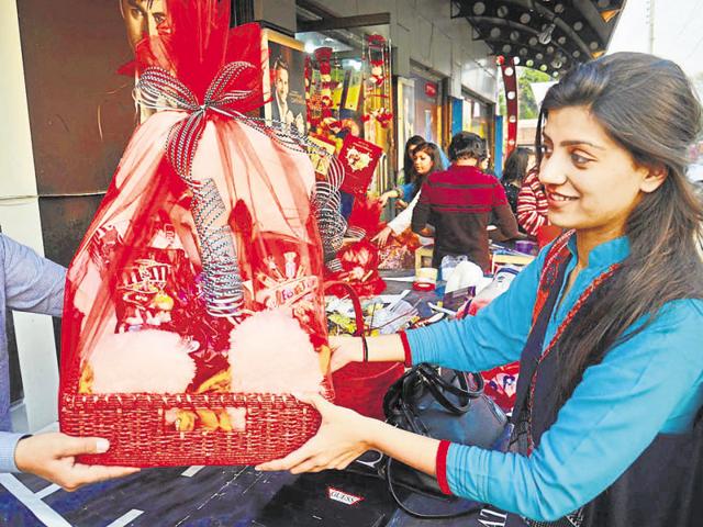 People take part in a Valentine’s Day celebration in Lahore.(LightRocket via Getty Images)