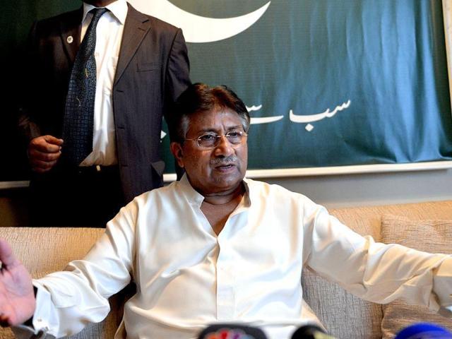 Former Pakistani President Pervez Musharraf talks to a journalist at his office in Dubai.(AP File Photo)
