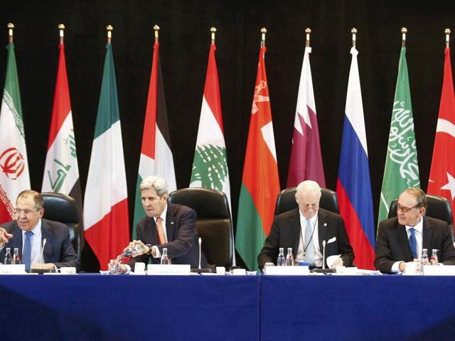 Russian foreign minister Sergei Lavrov (L) and US foreign secretary John Kerry (2L) attend the International Syria Support Group (ISSG) meeting in Munich, Germany. (REUTERS) Russian foreign minister Sergei Lavrov (L) and US foreign secretary John Kerry (2L) attend the International Syria Support Group (ISSG) meeting in Munich, Germany. (REUTERS)