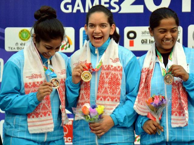 Gold medal winner Anjum Modgil (middle), with Silver Medal winner E Koshy (right) and Bronze Medal winner Lajja Goswami of India. (PTI Photo) Gold medal winner Anjum Modgil (middle), with Silver Medal winner E Koshy (right) and Bronze Medal winner Lajja Goswami of India. (PTI Photo)