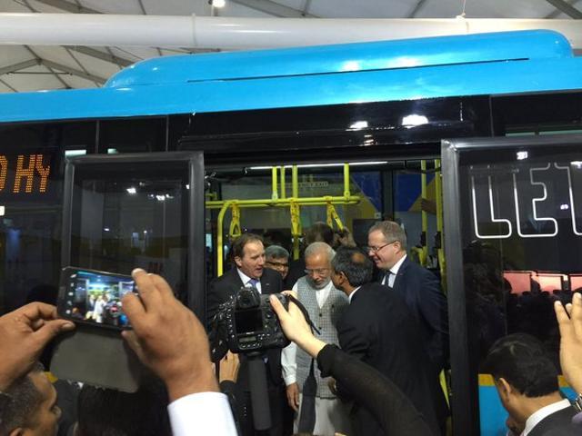 PM Modi boards the Make in India bus.  (Picture courtesy: PIB)