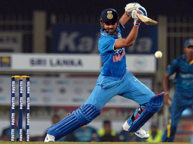 India's Ajinkya Rahane plays a shot during the second Twenty20 international match between India and Sri Lanka at the Jharkhand State Cricket Association International Stadium Complex in Ranchi on February 12, 2016.(AFP Photo)