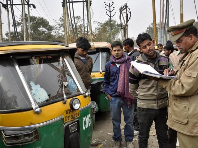 After the abduction of the Snapdeal executive, police undertakes the drive to find the defaulter auto drivers and also investigate on the auto driver accused in the case at vaishali metro station in Ghaziabad, India, on Saturday, February 13, 2016.(Sakib Ali/HT)