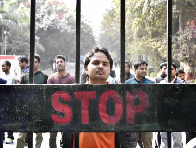 The Indian National Lok Dal student wing protests in front of Jawaharlal Nehru University against the role of JNUSU in alleged sedition related activities. (Vipin Kumar/HT Photo)