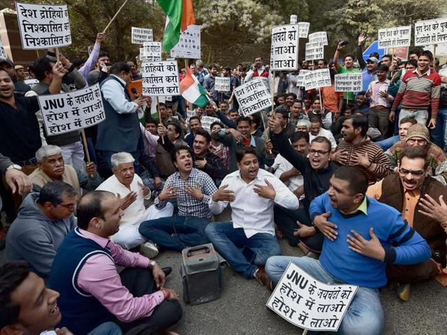 Residents of Munirka village protest outside the Jawaharlal Nehru University (JNU) against the organising of a meet to “mourn” the hanging of 2001 Parliament attack convict Afzal Guru. (PTI) Residents of Munirka village protest outside the Jawaharlal Nehru University (JNU) against the organising of a meet to “mourn” the hanging of 2001 Parliament attack convict Afzal Guru. (PTI)