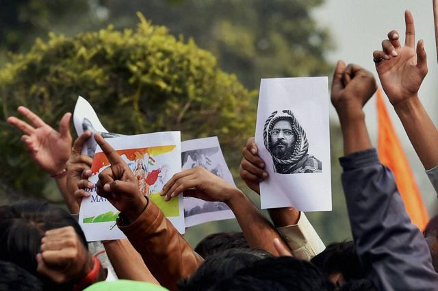Activists protest against ‘anti-India’ slogans shouted during a demonstration at the Jawaharlal Nehru University where students allegedly called the Parliament attack convict Afzal Guru a martyr. (PTI Photo) Activists protest against ‘anti-India’ slogans shouted during a demonstration at the Jawaharlal Nehru University where students allegedly called the Parliament attack convict Afzal Guru a martyr. (PTI Photo)