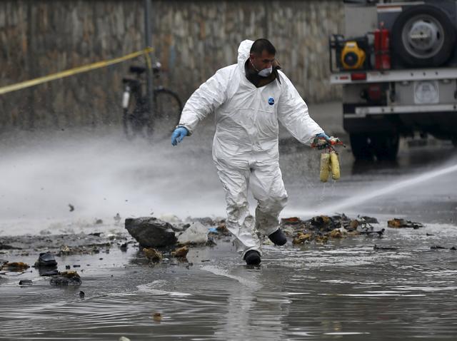A member of investigation team holds defused explosives at the site of a suicide attack in Kabul. Including Taliban-claimed attacks, more than half of the total civilian casualties last year were due to anti-government elements. (REUTERS) A member of investigation team holds defused explosives at the site of a suicide attack in Kabul. Including Taliban-claimed attacks, more than half of the total civilian casualties last year were due to anti-government elements. (REUTERS)