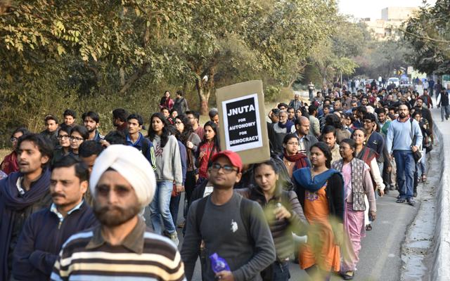 JNU teachers and students march inside the campus on Sunday to protest the arrest of JNUSU president Kanhaiya Kumar . (Sanjeev Verma/HT Photo) JNU teachers and students march inside the campus on Sunday to protest the arrest of JNUSU president Kanhaiya Kumar . (Sanjeev Verma/HT Photo)