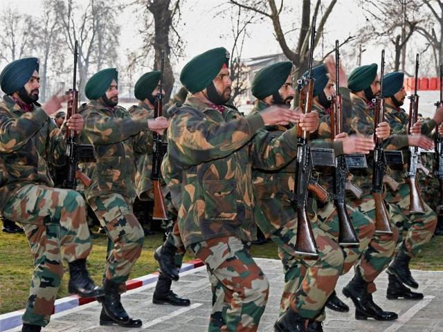 Soldiers paying tributes to two army Jawans during the wreath-laying ceremony in Srinagar on Sunday. (PTI PHOTO) Soldiers paying tributes to two army Jawans during the wreath-laying ceremony in Srinagar on Sunday. (PTI PHOTO)