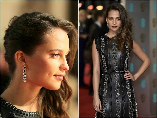 Alicia Vikander looked stunning and powerful in her black gown. Do not miss the gorgeous earrings. (Agencies) 