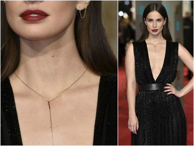 Heida Reed wore a daring black dress to the event. Her deep neckline was only made more beautiful by her sleek golden chain. (Agencies) 