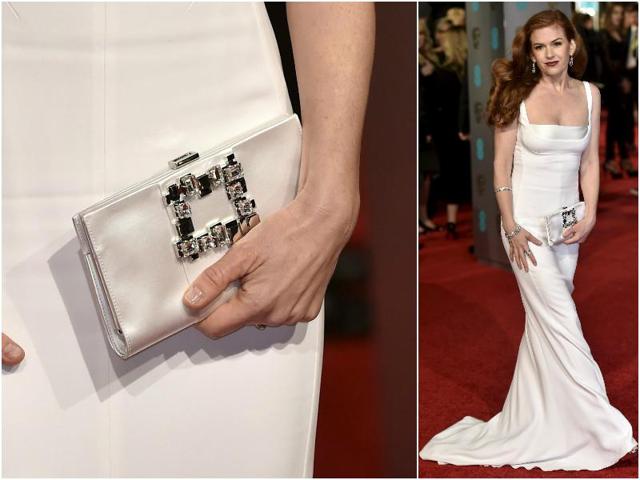 Isla Fisher in a dreamlike white gown. Check out her matching petite clutch. (Agencies) 