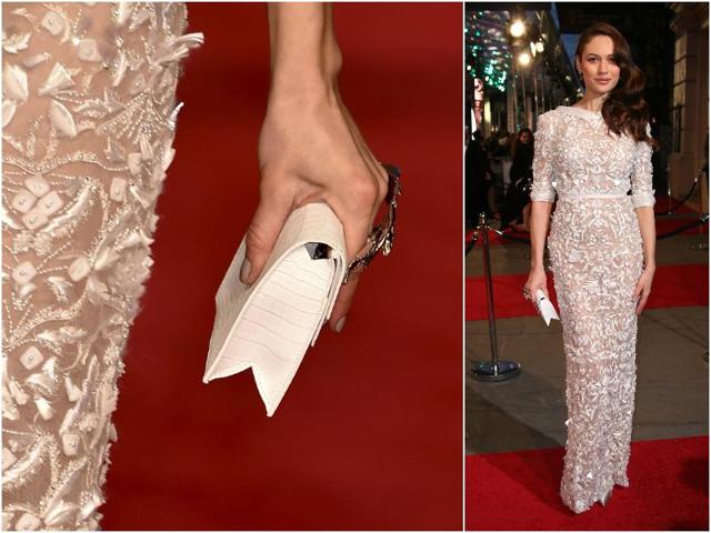 Olga Kurylenko in a sheer, sequined dress with a complimenting clutch. (Agencies) 