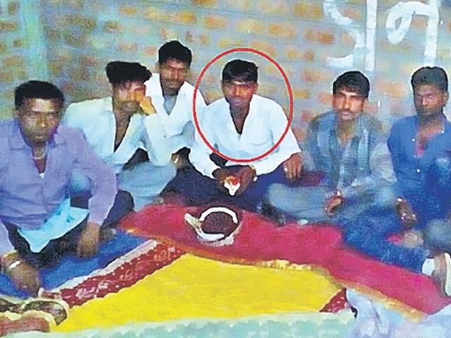 Groom Kanha (circled) waits with his friends, after a flying squad to check child marriages stopped the function in Indore. Groom Kanha (circled) waits with his friends, after a flying squad to check child marriages stopped the function in Indore.