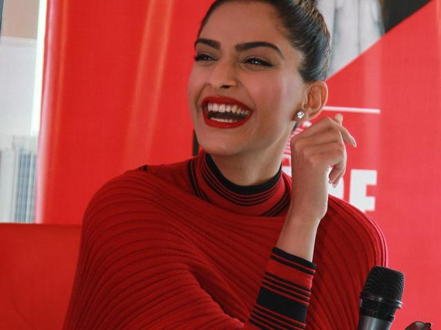 In town to promote the upcoming biopic Neerja, Sonam proved once again why she is a true fashionista, working this chic red high-neck knit number, like a perfect fashion girl.  (Waseem Gashroo/ HT Photo) 