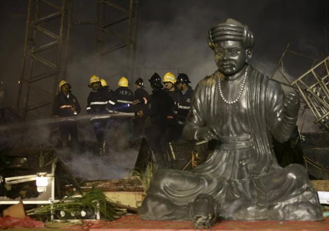 Firefighters try to extinguish a fire at the venue of a cultural event during 'Make in India' week in Mumbai, India, February 14, 2016. (REUTERS) Firefighters try to extinguish a fire at the venue of a cultural event during 'Make in India' week in Mumbai, India, February 14, 2016. (REUTERS)