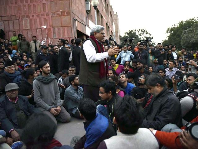 On Saturday, Kanhaiya Kumar’s arrest snowballed into a political free-for-all. CPI(M) secretary Sitaram Yechury joined protesters on the JNU campus demanding Kumar’s immediate release.(Vipin Kumar/HT photo)