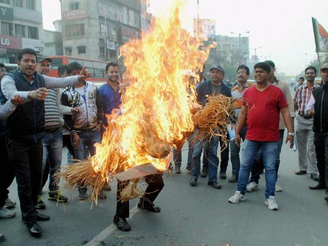 In Assam, activists of BJP burn an effigy of Congress vice president Rahul Gandhi on Monday who showed his support to the JNUSU over the Afzal Guru event . (PTI)