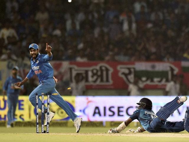 Sri Lankan batsman Seekkuge Prasanna is run out by Ravindra Jadeja. (PTI) 