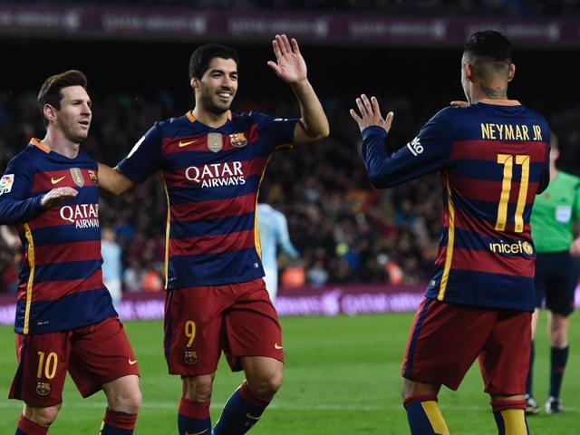 Barcelona forward Neymar (R) celebrates his goal with Lionel Messi (L) and Luis Suarez during the Spanish league football match FC Barcelona vs RC Celta de Vigo at the Camp Nou stadium. (AFP) Barcelona forward Neymar (R) celebrates his goal with Lionel Messi (L) and Luis Suarez during the Spanish league football match FC Barcelona vs RC Celta de Vigo at the Camp Nou stadium. (AFP)