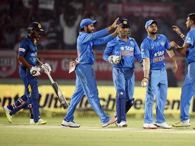 R Ashwin, MS Dhoni, Suresh Raina and Rohit Sharma celebrate the fall of a wicket.  (Ashok nath Dey/HT Photo) 