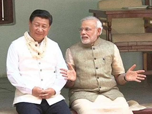 China's President Xi Jinping with Prime Minister Narendra Modi during his visit to Sabarmati Ashram in Ahmedabad. Chinese state media has said India is manipulating and creatively using economic data against China. (AFP File Photo) China's President Xi Jinping with Prime Minister Narendra Modi during his visit to Sabarmati Ashram in Ahmedabad. Chinese state media has said India is manipulating and creatively using economic data against China. (AFP File Photo)