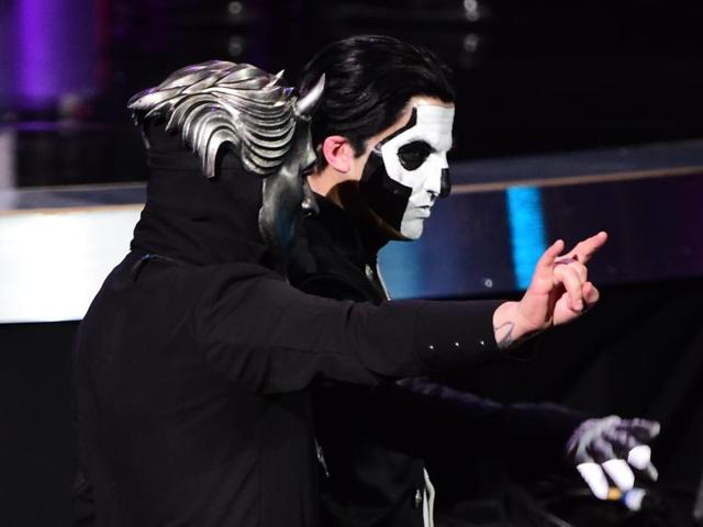 Members of the metal band Ghost walk to the stage to receive the award for the Best Metal Performance, Circle onstage during the 58th Annual Grammy music Awards in Los Angeles February 15.  (AFP) 