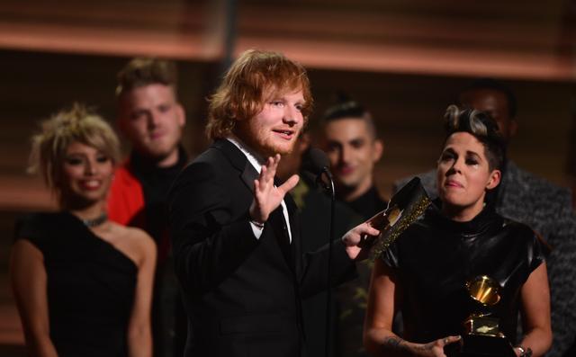 Ed Sheeran recieves the award for the Song of the Year, Thinking Out Loud during the 58th Annual Grammy music Awards in Los Angeles. (AFP) Ed Sheeran recieves the award for the Song of the Year, Thinking Out Loud during the 58th Annual Grammy music Awards in Los Angeles. (AFP)