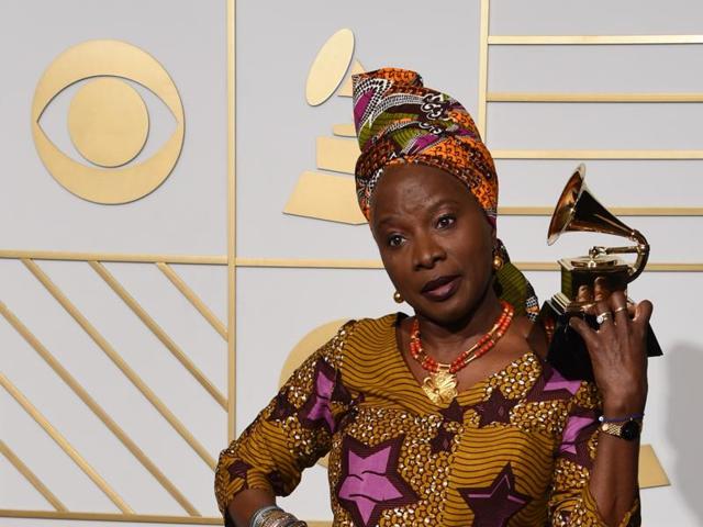 Angelique Kidjo poses with her Best World Music Album trophy for Sings in the press room during the 58th Annual Grammy Music Awards on February 15.  (AFP) 