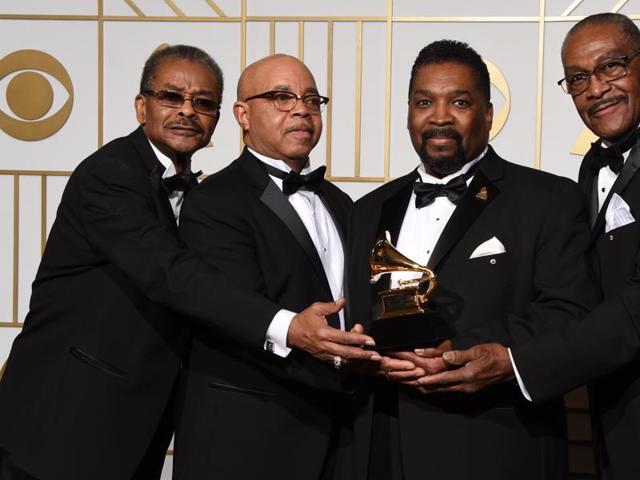 The Fairfield Four hold their Best Roots Gospel Album trophy for Still Rockin' My Soul in the press room during the 58th Annual Grammy Music Awards. (AFP) 