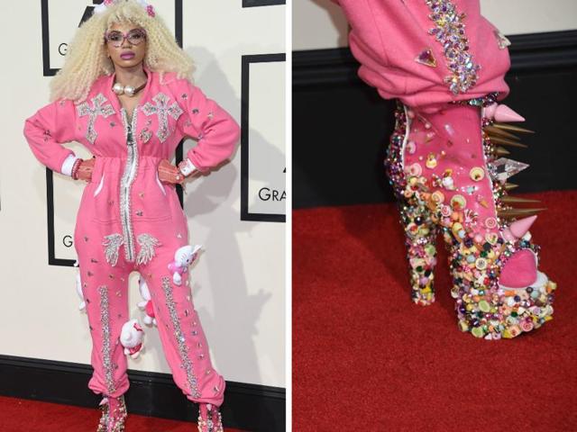BAD: Dencia wore a pink onesie to Grammys. She then accessorised it with hello Kitty. And wore shoes from outer space to go with it. It is worse than it sounds. (Reuters) 