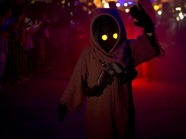 In this Feb. 14, 2016 photo, a youth sporting a Star Wars costume parades at the annual Alien Festival in Capilla del Monte, Cordoba, Argentina, the site of an alleged UFO sighting 30 years ago. Thousands of earthlings gathered for the festival in this central Argentine town which has become a global hot spot for UFO sightings. (AP Photo/Natacha Pisarenko) (AP) In this Feb. 14, 2016 photo, a youth sporting a Star Wars costume parades at the annual Alien Festival in Capilla del Monte, Cordoba, Argentina, the site of an alleged UFO sighting 30 years ago. Thousands of earthlings gathered for the festival in this central Argentine town which has become a global hot spot for UFO sightings. (AP Photo/Natacha Pisarenko) (AP)