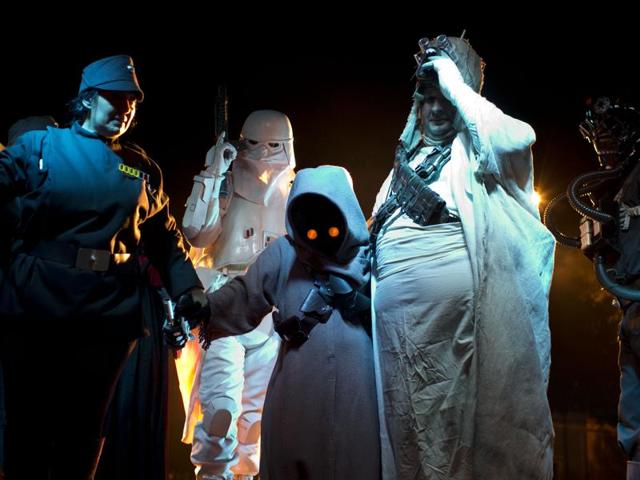 People dressed as Star Wars characters exit the stage during the annual festival. (AP) People dressed as Star Wars characters exit the stage during the annual festival. (AP)